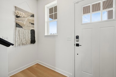 (Photo of a decorated model, actual homes colors and finishes will vary) The entryway is bright and spacious, making your guests feel at home!