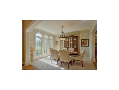 Arched windows accent dining room!