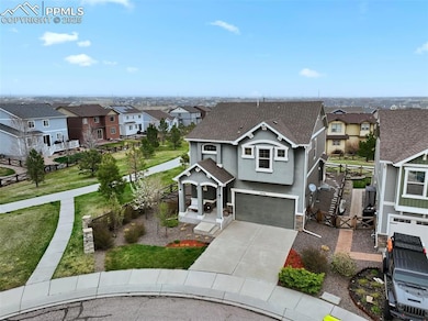 View of front of home featuring a garage, a reside