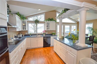 Large, bright kitchen with plenty of storage and c
