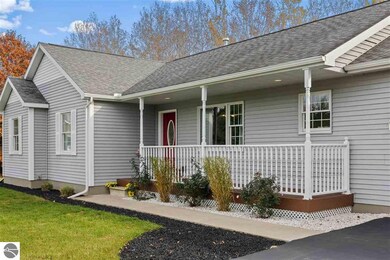 3238 Tamara Cir, Grawn, MI 49637 - photo 5