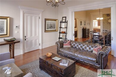 Open living/dining area with large pocket doors be