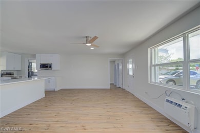 Kitchen with appliances with stainless steel finis
