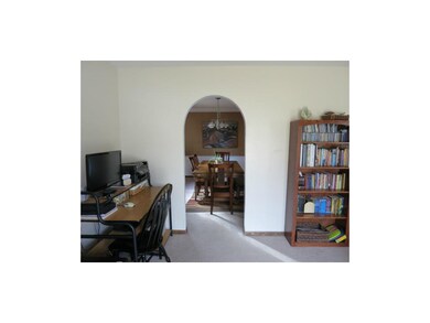 Continue through a delightful archway to the forma