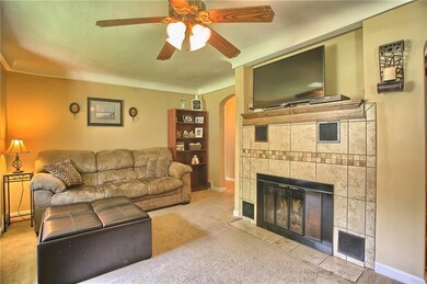 Living room with updated fireplace and mantle perf
