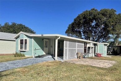 COVERED CARPORT AND SIDE PATIO AREA