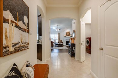 Hallway with washer / clothes dryer, light hardwoo