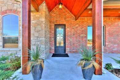 A lovely grand entrance with stained bead board ce