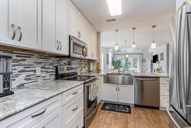 Kitchen with appliances with stainless steel finis