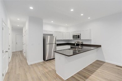 Model photos of townhomes.