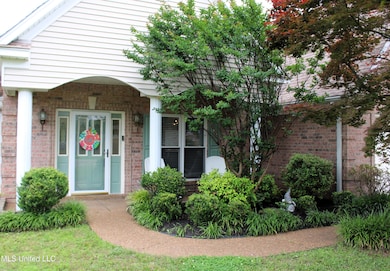 Covered Front Porch and Landscaping