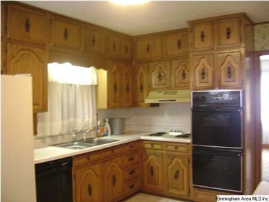Beautiful Eat-in kitchen with Solid wood cabinets 