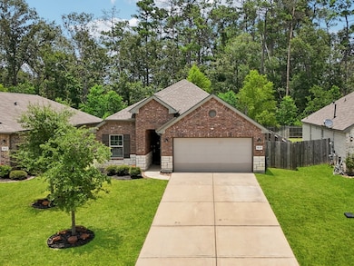 Look at the gorgeous trees behind this home. So be