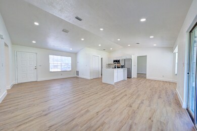 living room open to kitchen (2)
