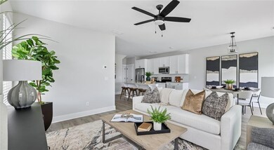 Living room featuring light wood-style flooring, c