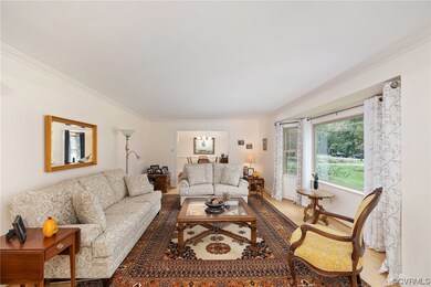 Living room featuring light hardwood flooring and