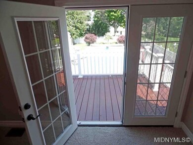 French door to deck & backyard