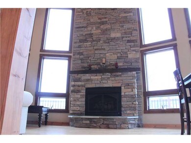 Living Room. THE MAGESTIC HAND BUILT STONE FIREPLA