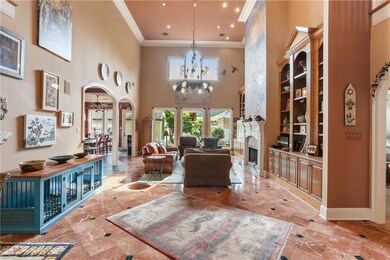 Huge living room with soaring ceiling, wood burnin