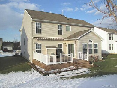 Exterior Back. Convenient Composite deck off the M