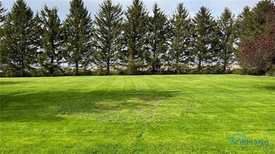 Beautiful corner lot surrounded by pine trees!