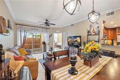 Dining space featuring ceiling fan, light tile pat