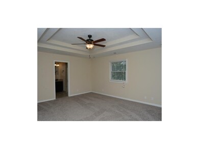 Master Bedroom with new ceiling fan and new interi