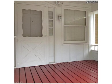 The freshly painted front porch makes a great firs