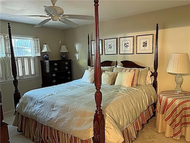Bedroom featuring carpet flooring and ceiling fan