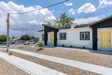 View of front facade featuring stucco siding