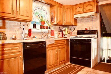 The kitchen cabinets were recently re-faced with t