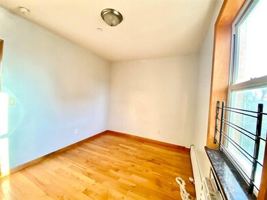 Unfurnished room featuring light wood-type floorin