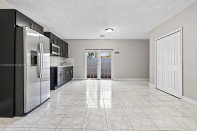 Modern kitchen with nice cabinetry and generous countertop space.