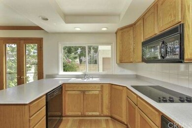 Kitchen looks out onto Patio