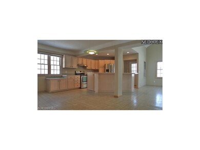 Open Great Room/Kitchen with skylights and ceramic