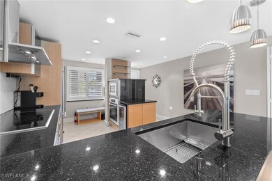 3001 Sandpiper Bay Cir unit 103, Naples, FL 34112 - photo 2