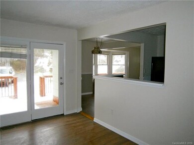 Kitchen On Right & Dining Room In Distance