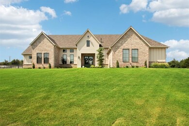View of front of house with a front lawn