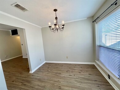 Dining room opens to Living Room and Kitchen.  Dining Room measures 10' x 9'.
