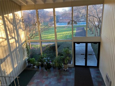 Lobby with floor to ceiling windows overlooking co