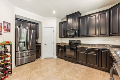 A spacious walk in pantry offers additional storag