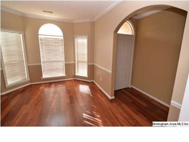 Another View of dining room with arched doorways.