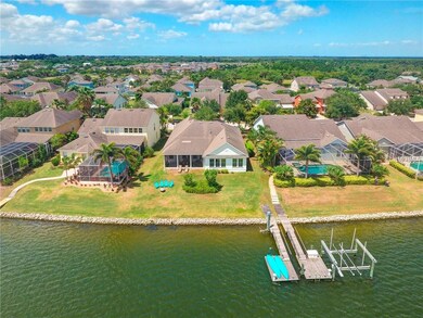 Aerial View of Home, Backyard, Dock with Jet Ski L