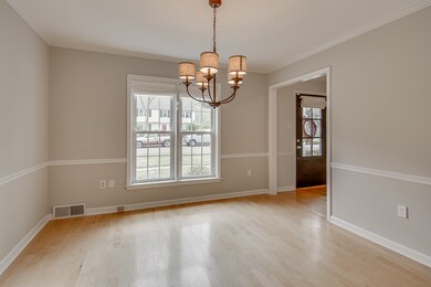 Formal dining room near front door accessible from
