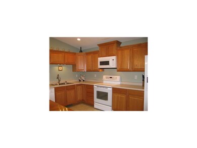 Kitchen. Large eat-in kitchen with oak cabinets an