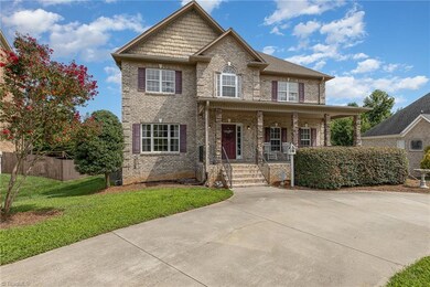 The large level Circle Drive offers easy access to unload your car; or for additional parking!