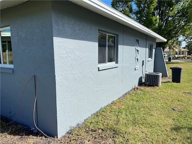 View of home's exterior featuring central AC unit