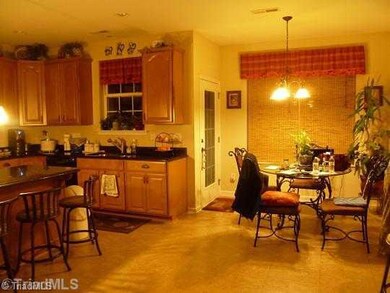 Kitchen. Another shot of the kitchen showing the extended breakfast area.