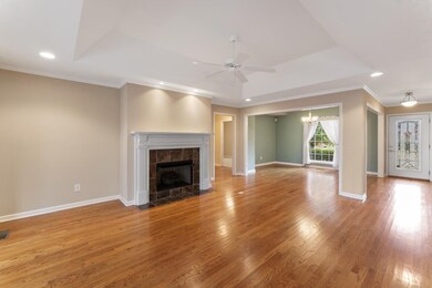 The living room tray ceiling creates an open and inviting space.