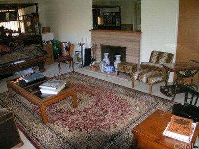 Formal living room w/fieplace of Owner's residence